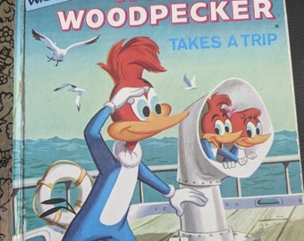 Vintage Little Golden Book- Woody Woodpecker takes a trip 1961/1974