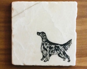 May include: A black and white illustration of a dog on a white marble coaster.