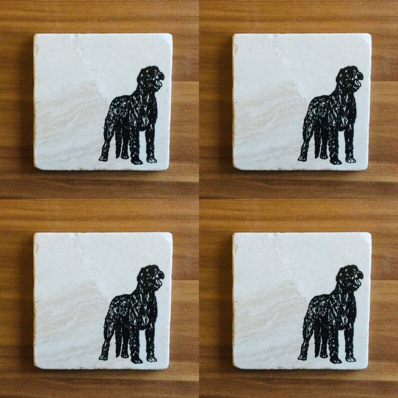 May include: Set of four white coasters with black silhouette images of a dog. Each coaster features a different pose of the dog.