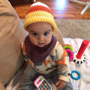 Adorabile cappello di caramelle di mais
