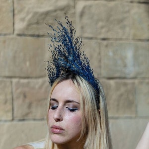 Crown of dark preserved blue flowers high triangular