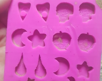 Mold in silicone lobe earrings - creepy version