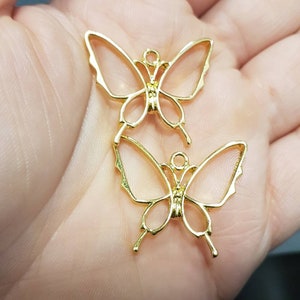 OPEN BEZEL farfalle - ciondolo uv resin x 2 pcs