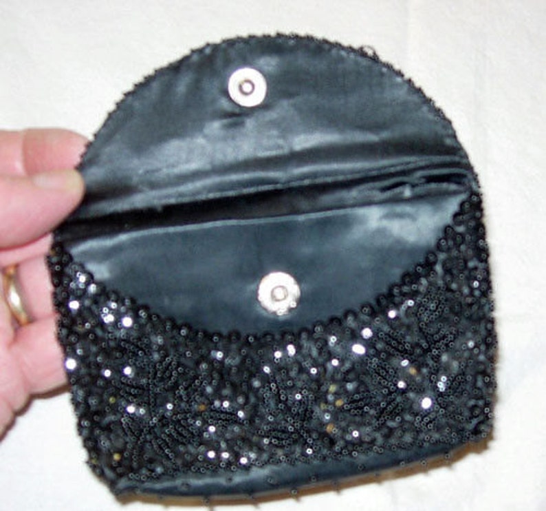 little black clutch