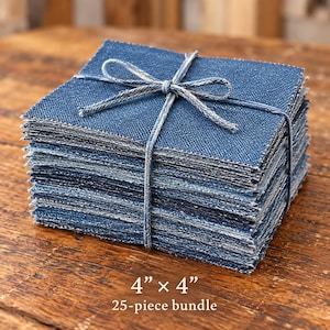 May include: A stack of 25 square denim fabric pieces measuring 4 inches by 4 inches, tied together with a matching blue string tied in a bow. The fabric has a textured, woven blue surface with frayed edges visible on the sides of the stack.
