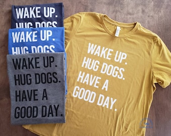 Wake up. Hug dogs. Have a good day. women's relaxed fit tee t-shirt women's clothing