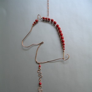 Beautiful beaded horse sun catcher