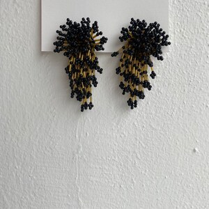 vintage black and gold beaded starburst clip on earrings image 1