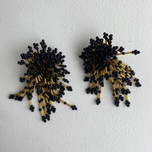 vintage black and gold beaded starburst clip on earrings image 2