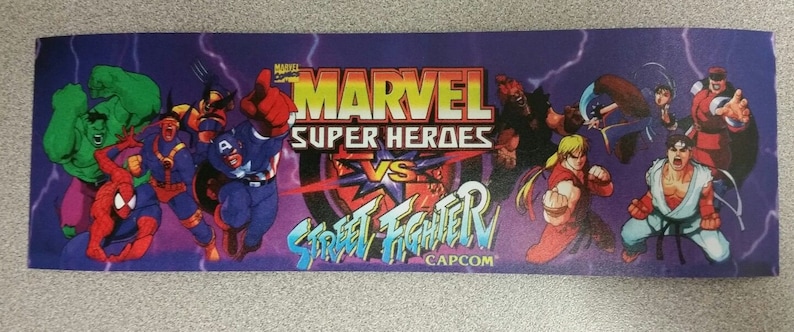 Buy any 3 of my stickers, GET ONE FREE! Marvel Vs Street Fighter marquee sticker.