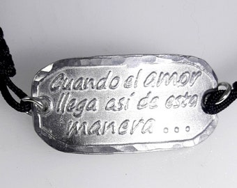 Venezuela aluminum bracelet with Caballo Viejo  "Cuando el amor llega asi de esta manera". Custom text on the back.