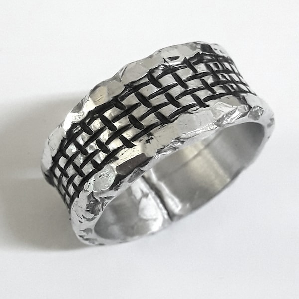 Aluminum ring band, with blackened grid textures, polished with hammered edge, and personalized text