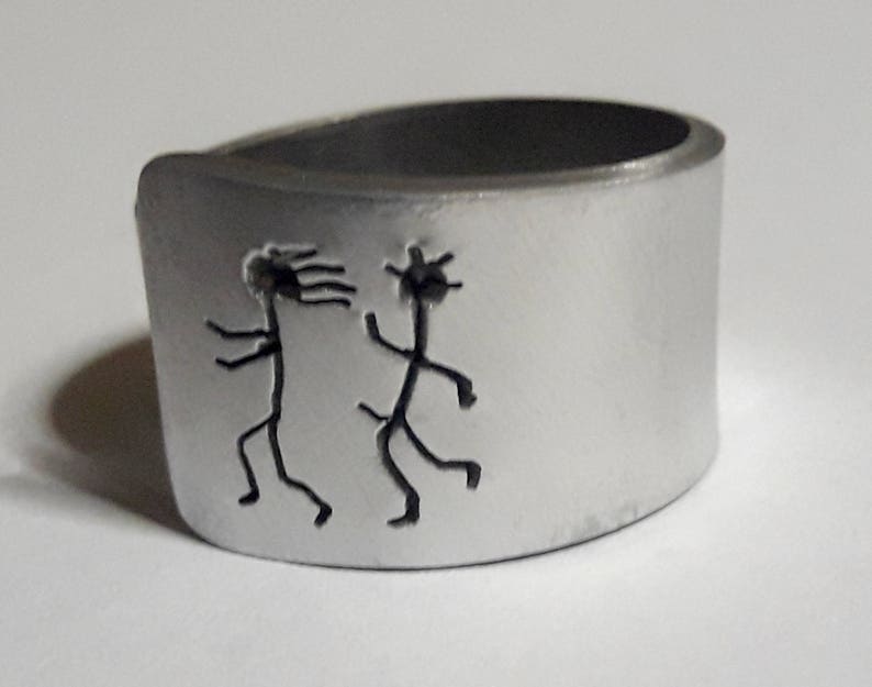 Open aluminum band ring with: He follows her, and custom text. image 1