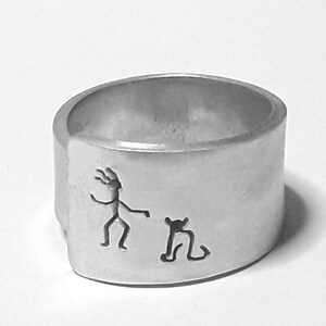 Open aluminum band ring with she and her cat, and custom text.