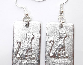 Personalized text, aluminum lightweight earrings, engraved with cat designs.