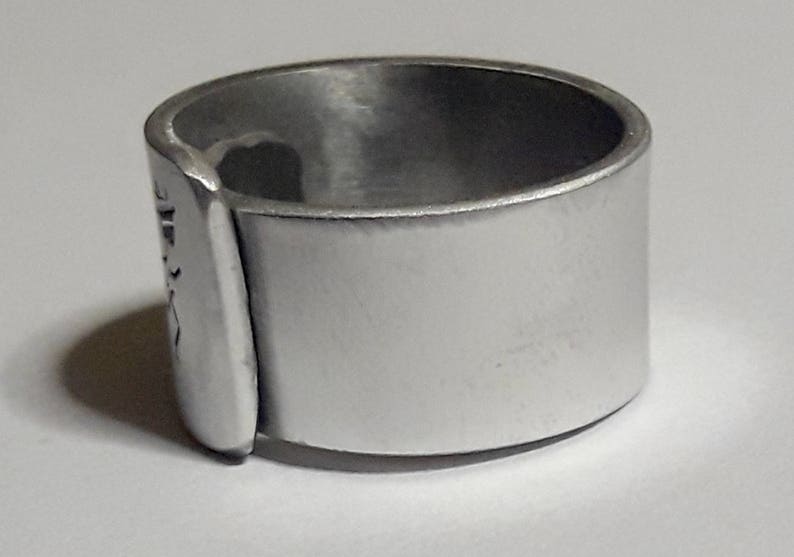 Open aluminum band ring with: He follows her, and custom text. image 3