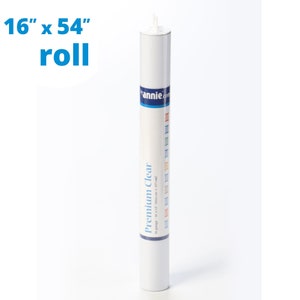 May include: A white tube of clear, premium vinyl film, labeled "Premium Clear" and "16" x 54" (140.6 cm x 177 cm)". The tube is labeled with the brand name "annie.com".