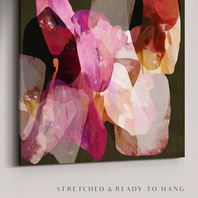 May include: Abstract art print featuring overlapping shapes in shades of pink, red, and brown. The shapes have a textured, watercolor-like appearance with a subtle sparkle effect.