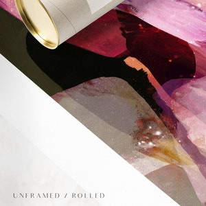 May include: Abstract art print with a pink, red, and gold color scheme. The print is rolled up and ready to be framed.