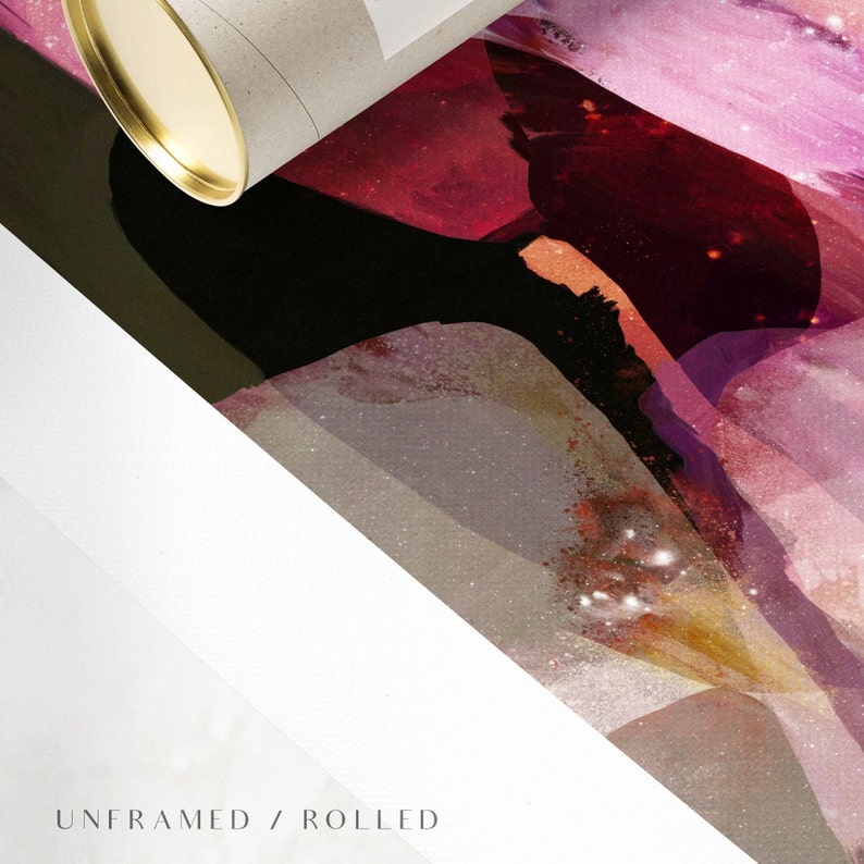 May include: Abstract art print with a pink, red, and gold color scheme. The print is rolled up and ready to be framed.