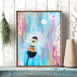 May include: A painting of a bumblebee on a flower with a blue, pink, and gold background. The bee is yellow and black with white wings. The flower is white with a blue center. The background is abstract with a honeycomb pattern.