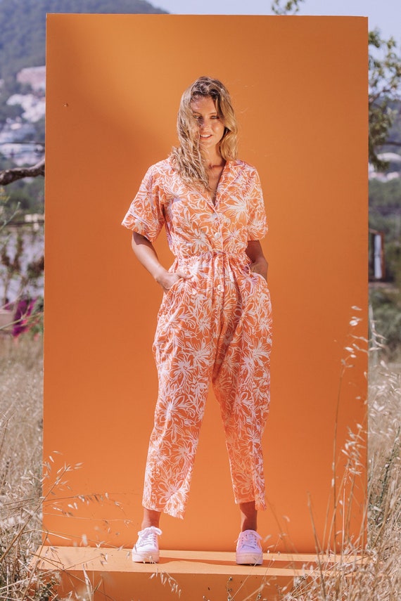 Orange hotsell floral jumpsuit
