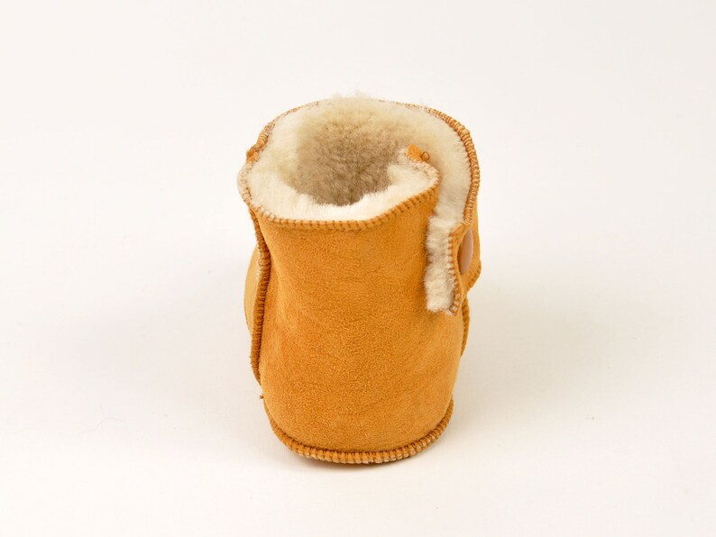 Handmade tobacco ankle boots fur slippers for babies. Genuine sheepskin. Soft, warm and comfortable image 5