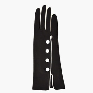Handmade black and white lambskin leather gloves. Really soft and elegant.