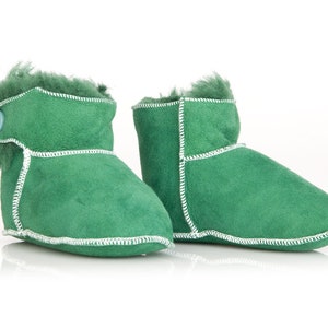 Handmade tobacco ankle boots fur slippers for babies. Genuine sheepskin. Soft, warm and comfortable Green