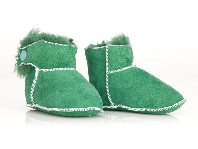 Handmade tobacco ankle boots fur slippers for babies. Genuine sheepskin. Soft, warm and comfortable Green