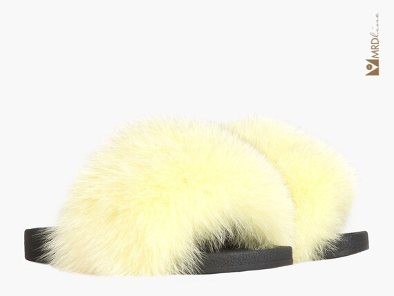 yellow fox fur slides