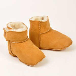 Handmade tobacco ankle boots fur slippers for babies. Genuine sheepskin. Soft, warm and comfortable image 3