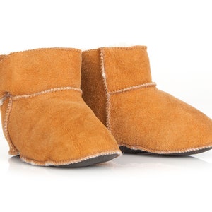 Handmade tobacco ankle boots fur slippers for babies. Genuine sheepskin. Soft, warm and comfortable Tobacco