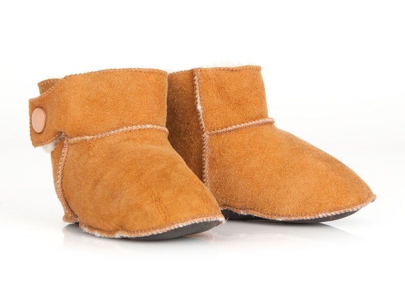 Handmade tobacco ankle boots fur slippers for babies. Genuine sheepskin. Soft, warm and comfortable Tobacco