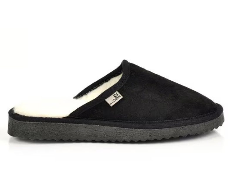 May include: Black suede slippers with a white sheepskin lining. The slippers have a rubber sole.