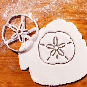 Grote zanddollarkoekjesvorm: nautisch strandthema voor zomerfeest