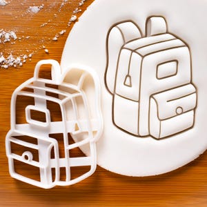 Emporte-pièce à dos - Cuire des biscuits pour la rentrée