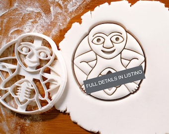 Cortador de galletas Sheela Na Gig: herramienta de repostería inspirada en el folclore medieval y la historia del arte.