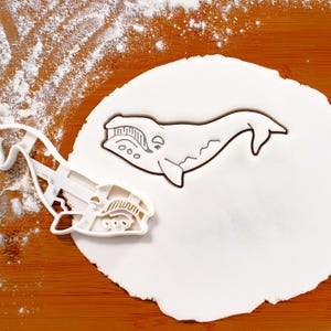 Emporte-pièce à l'emporte-pièce Baleine noire : thème de la biologie marine nautique