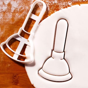 Koekjesuitsteker met toiletplunjer: beleef speelse bakavonturen!