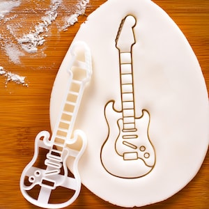 エレキギターのクッキーカッター - ギタリストや音楽愛好家のために、弦楽器のビスケットを焼きましょう