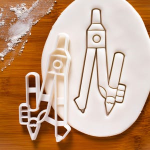 Cortador de galletas con forma de brújula: herramienta de matemáticas e ingeniería para estudiantes, profesores y arquitectos.