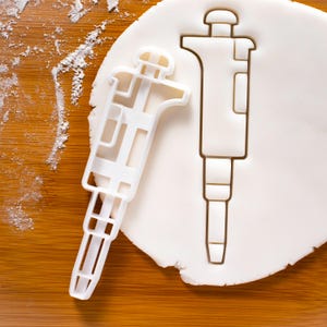 Micropipette cookie cutter | Microbiology Chemistry Biology Medicine pipette biscuit cutters cookies laboratory tool science pipettes pipet