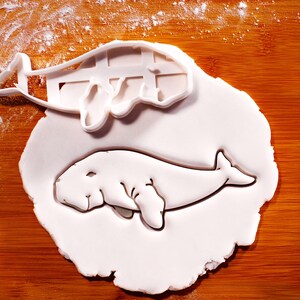 Emporte-pièce en forme de dugong de natation : outil de cuisson Marine Life