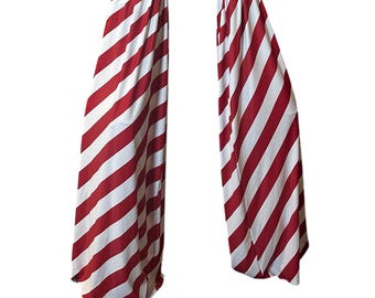Vibrant Stilt Covers: Festive Leg Wear for Circus Acts, Carnival Performers & Street Entertainers
