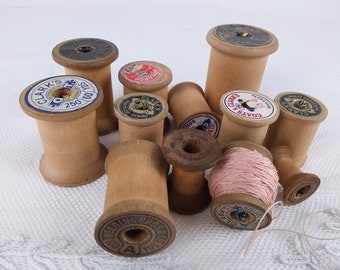 Lot of 12 vintage wooden Clarks spools interesting sizes, rare shapes, manufacturing info carved into the wood, old elaborate labels, NO. 2