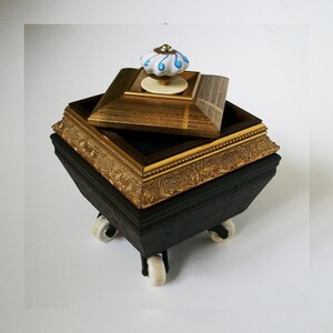 Upcycled Carved Wooden Box with Porcelain Handle & Ceramic Wheels