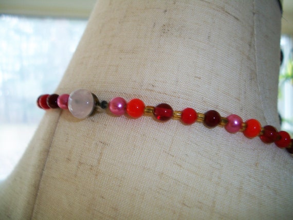 Long beaded necklace, opaque reds, pinks, rose an… - image 6