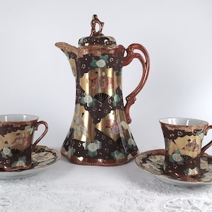 Gilded chocolate pot with cups for two! Japanese porcelain coffee set in rich browns and gold with overlapping painted fans and daisies
