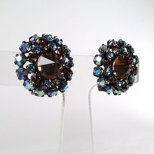 Schreiner clip-on cluster earrings, Extraordinary prong set jewels in amber, blues. purples, 1940s, Henry Schreiner Jewelry Co, New York